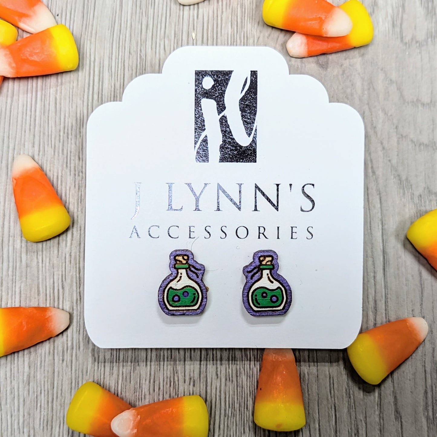 Hand painted poison bottle wooden stud earrings