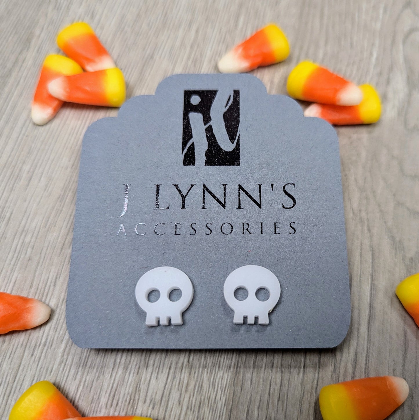 Acrylic skull earrings in white