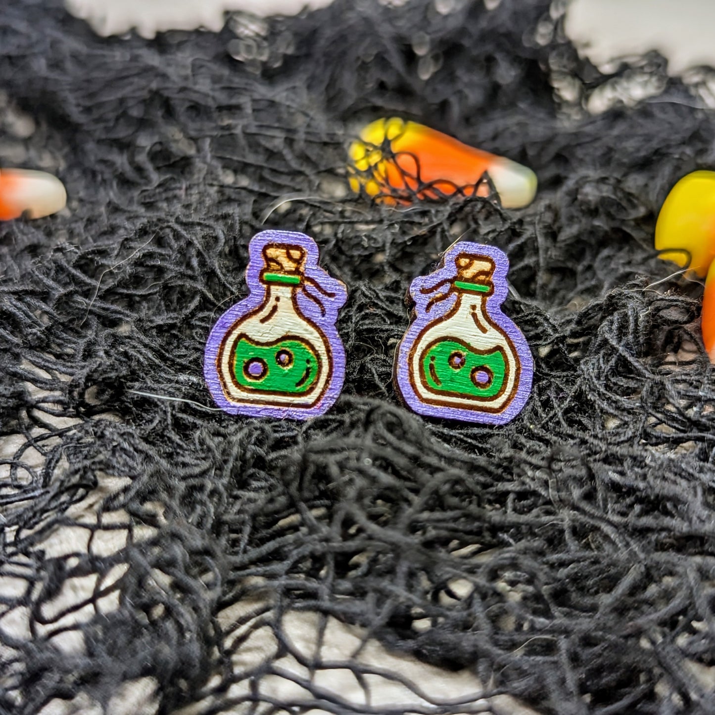 Hand painted poison bottle wooden stud earrings