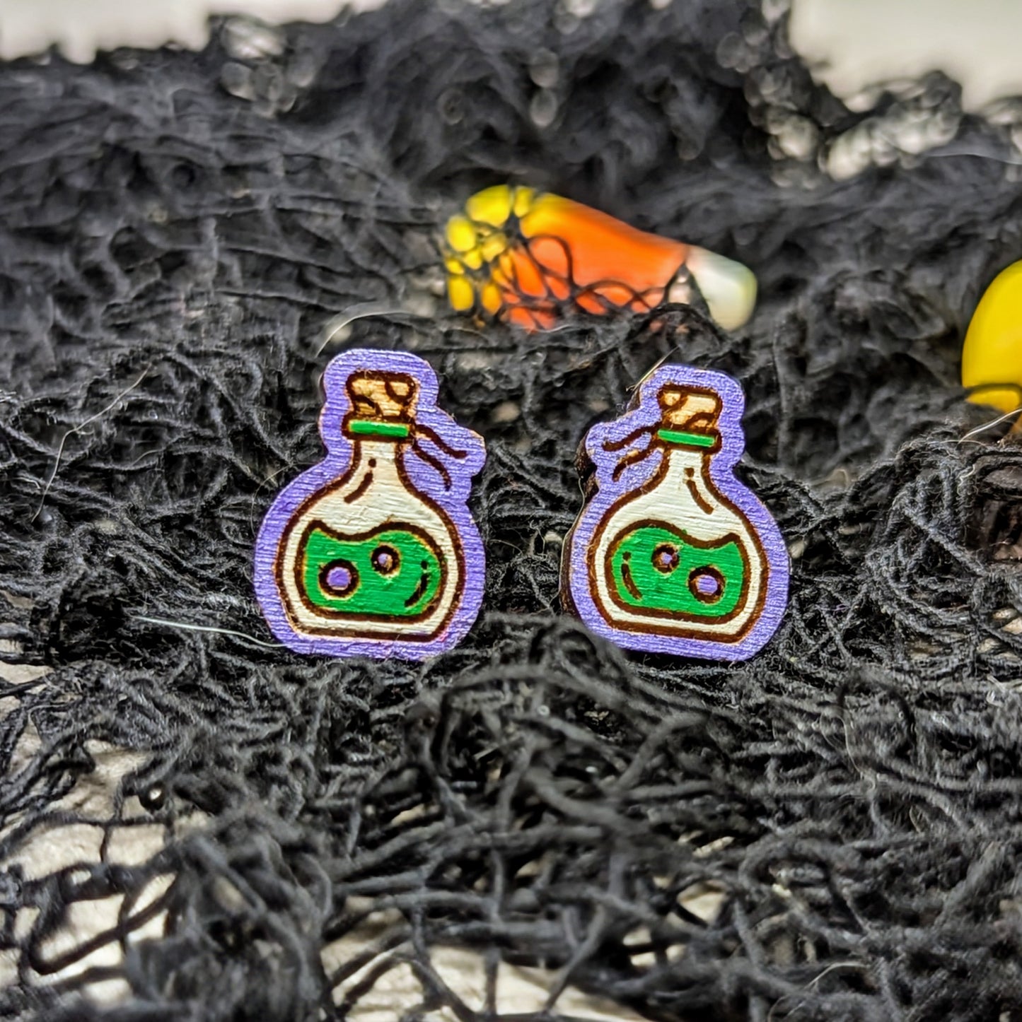 Hand painted poison bottle wooden stud earrings