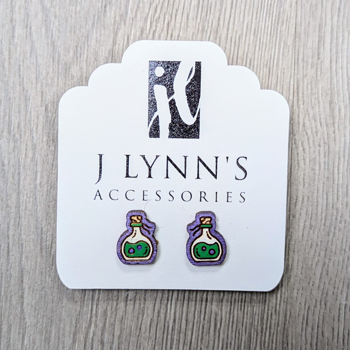 Hand painted poison bottle wooden stud earrings
