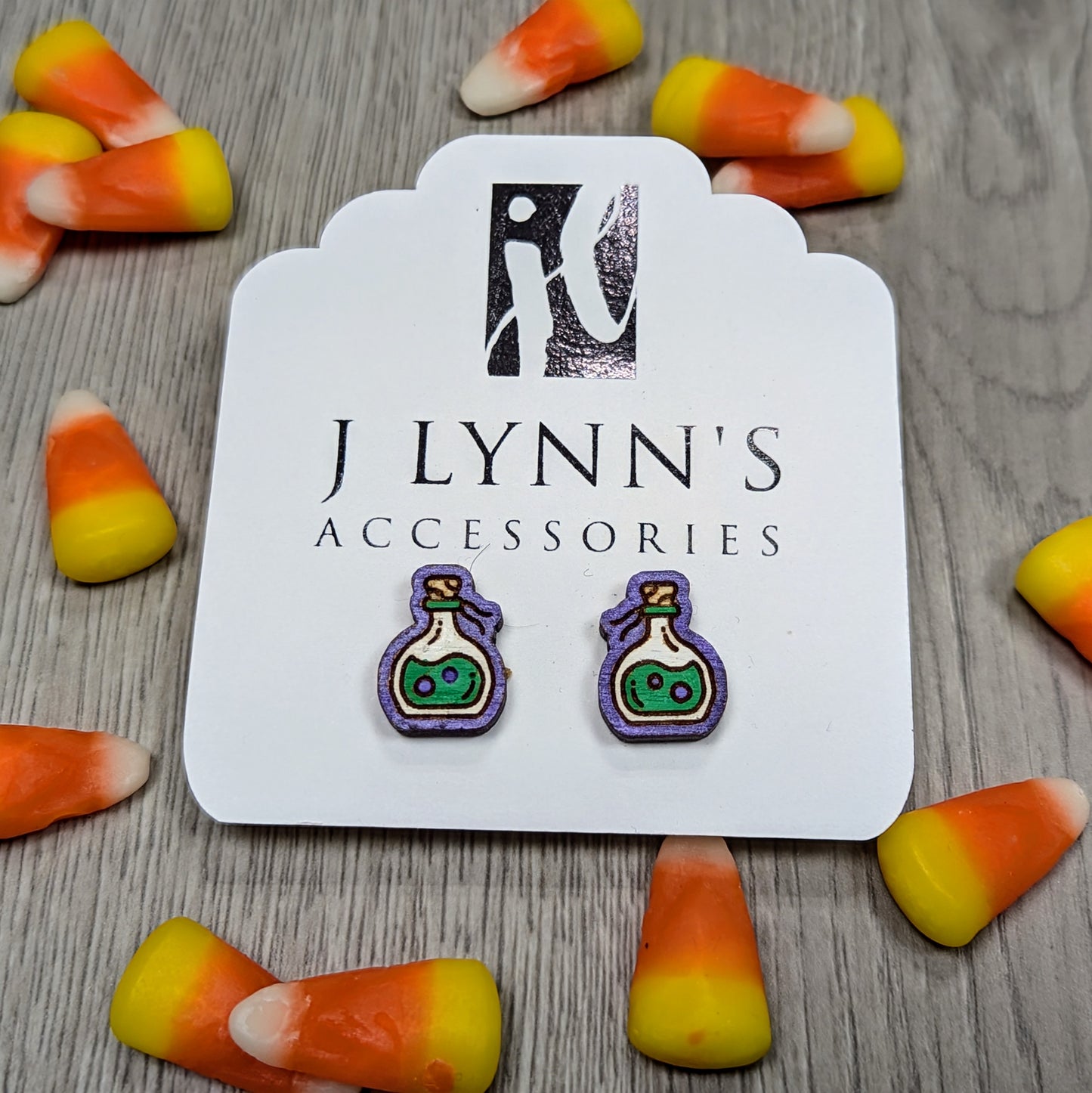 Hand painted poison bottle wooden stud earrings