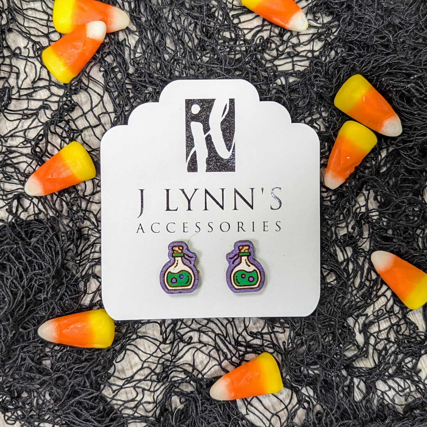 Hand painted poison bottle wooden stud earrings