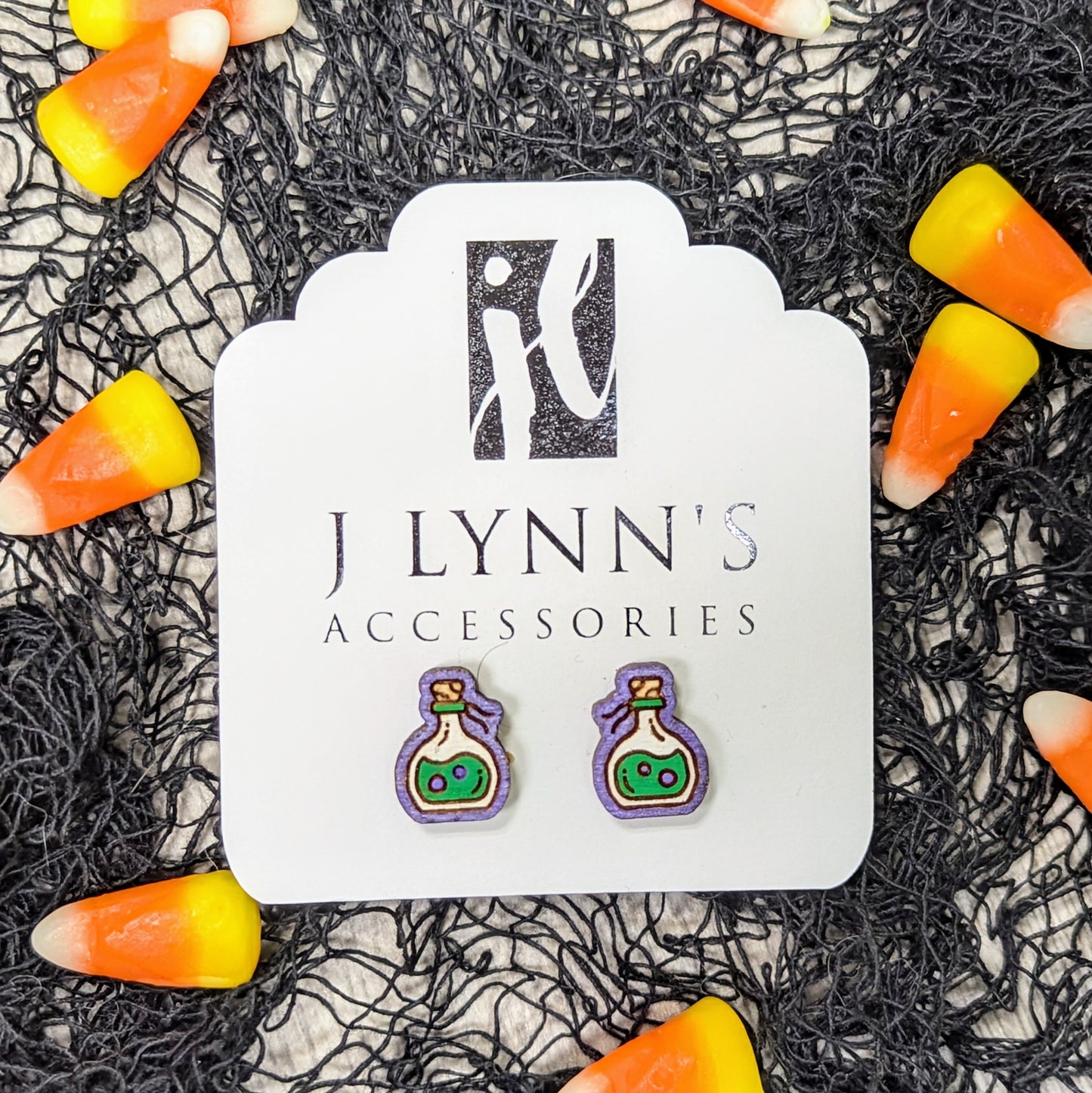 Hand painted poison bottle wooden stud earrings