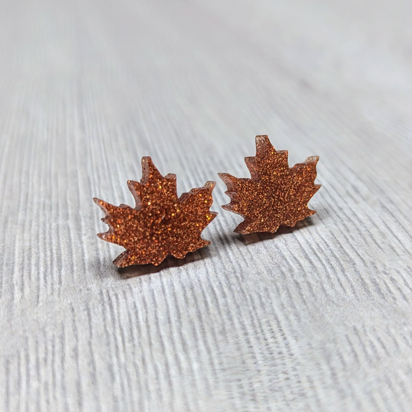 Acrylic glitter leaf earrings in an autumn harvest color
