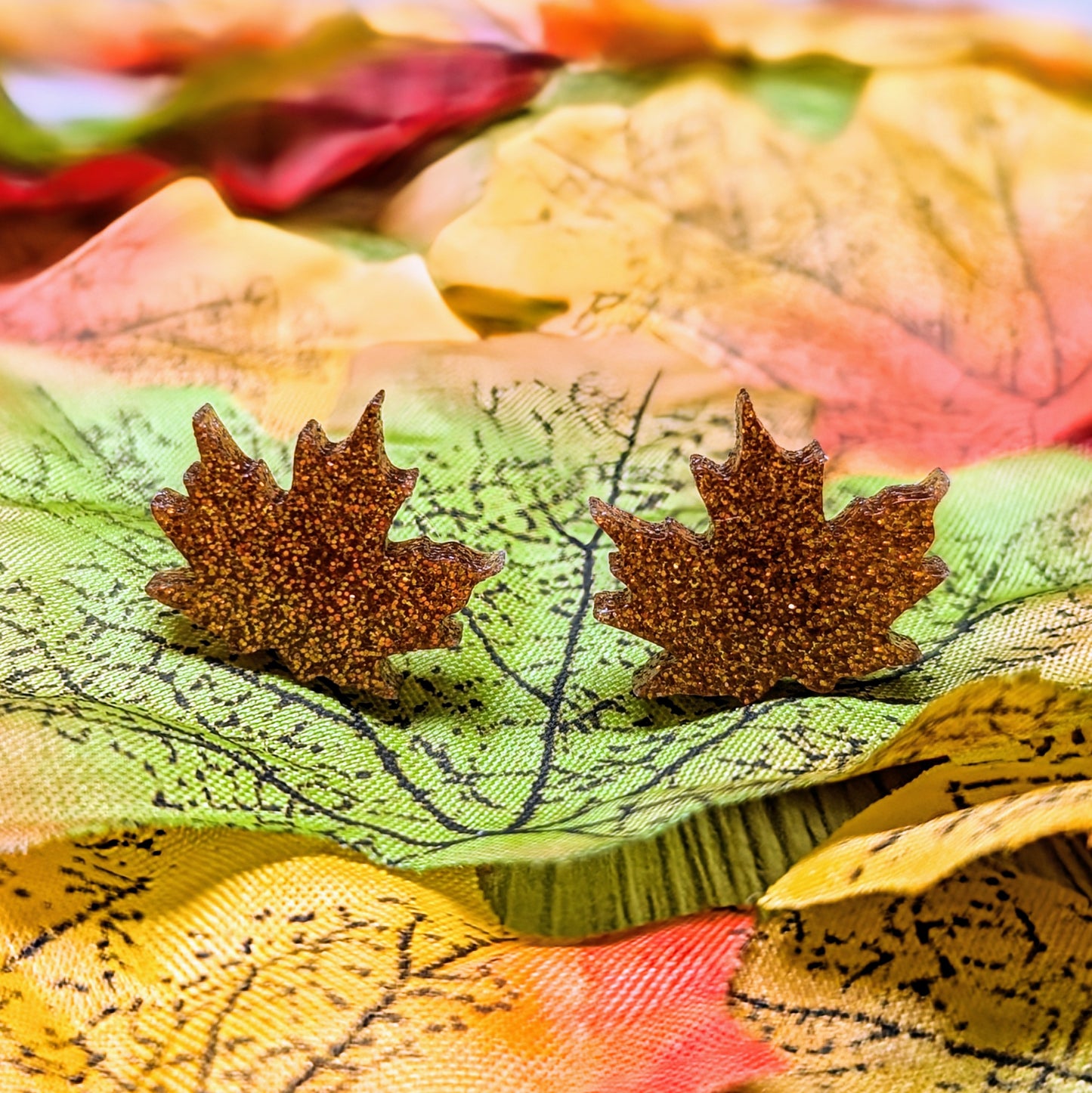 Acrylic glitter leaf earrings in an autumn harvest color