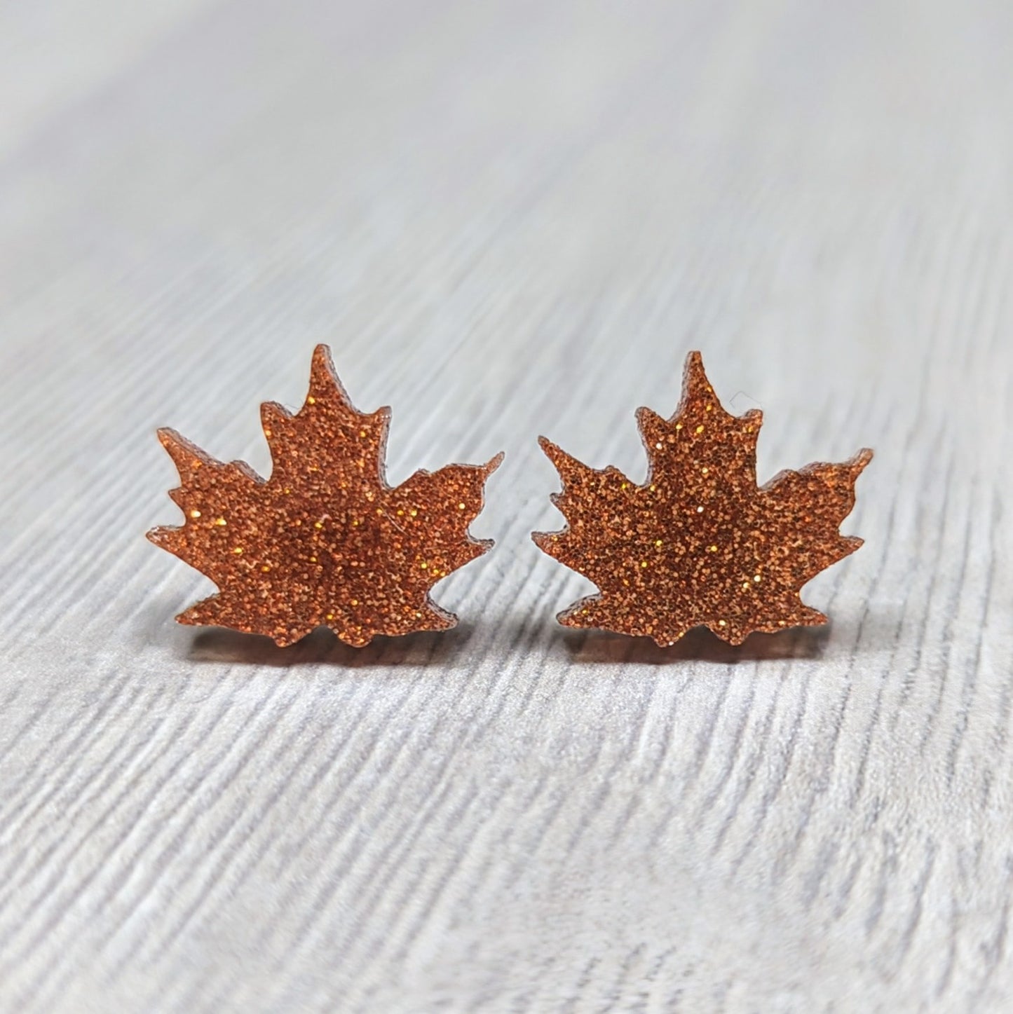 Acrylic glitter leaf earrings in an autumn harvest color
